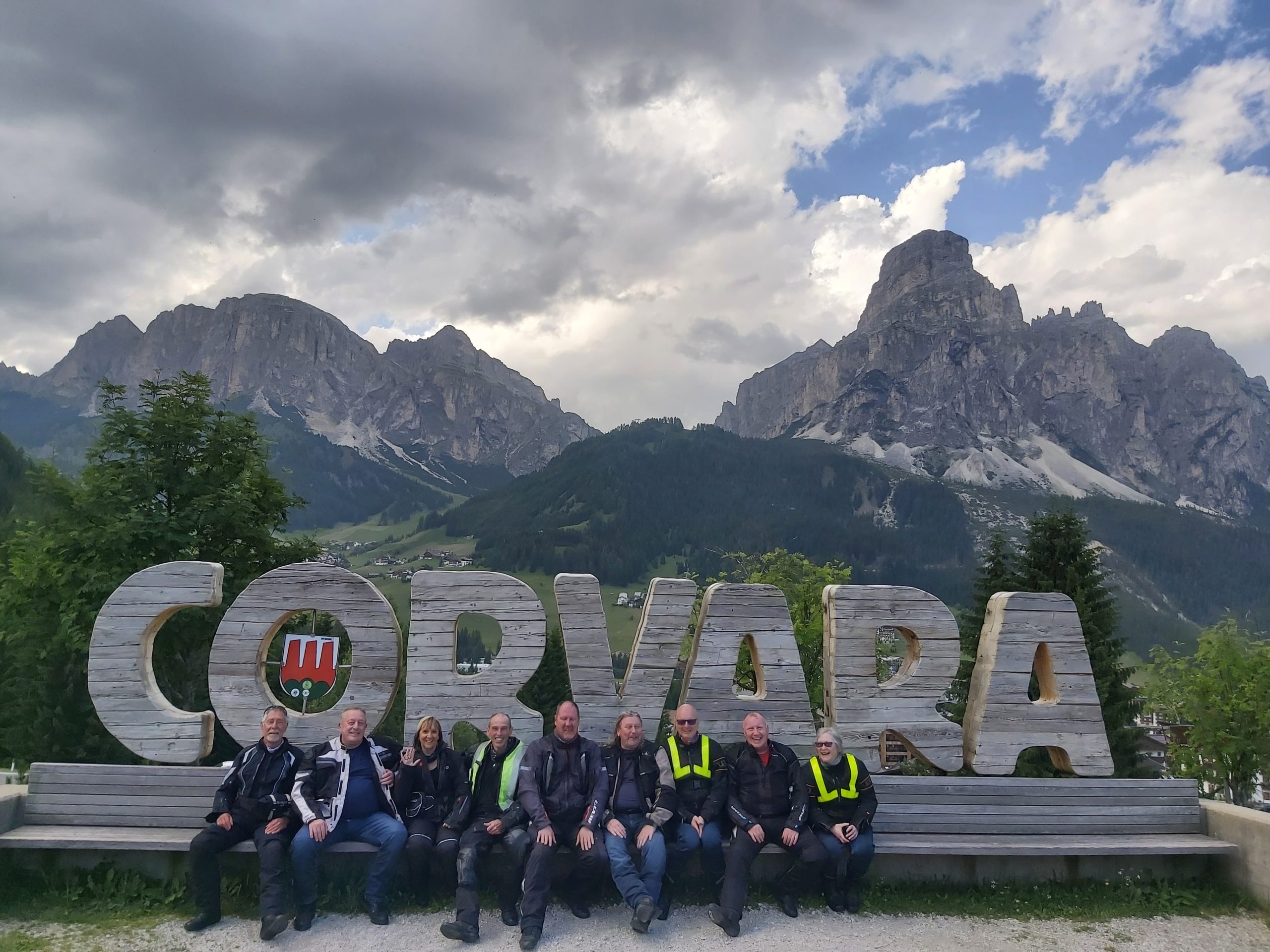 Corvara Dolomites wooden town sign
