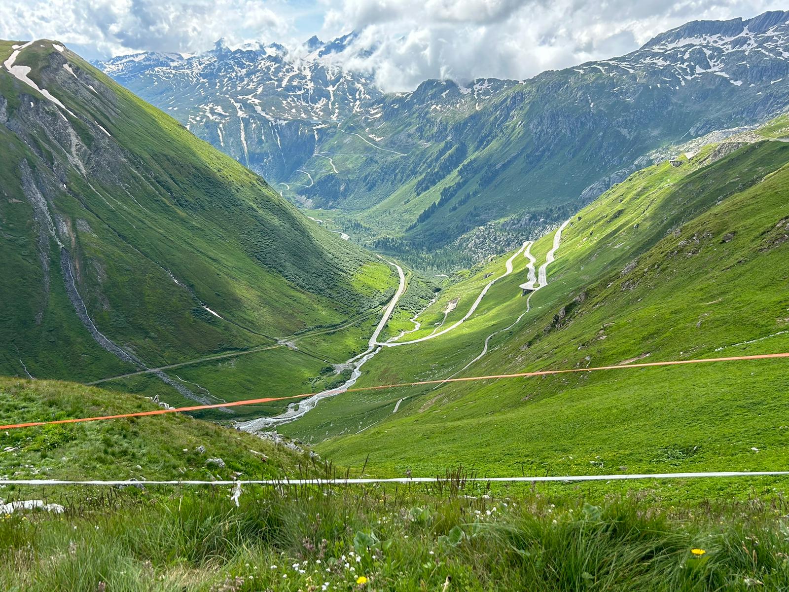 Swiss mountain pass hairpin curves motorcycle