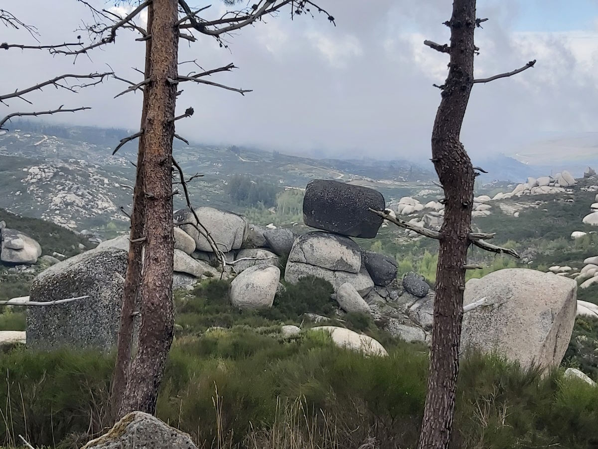 Serra da Estrela highest peak mainland Portugal balancing rock mountain roads breathtaking views