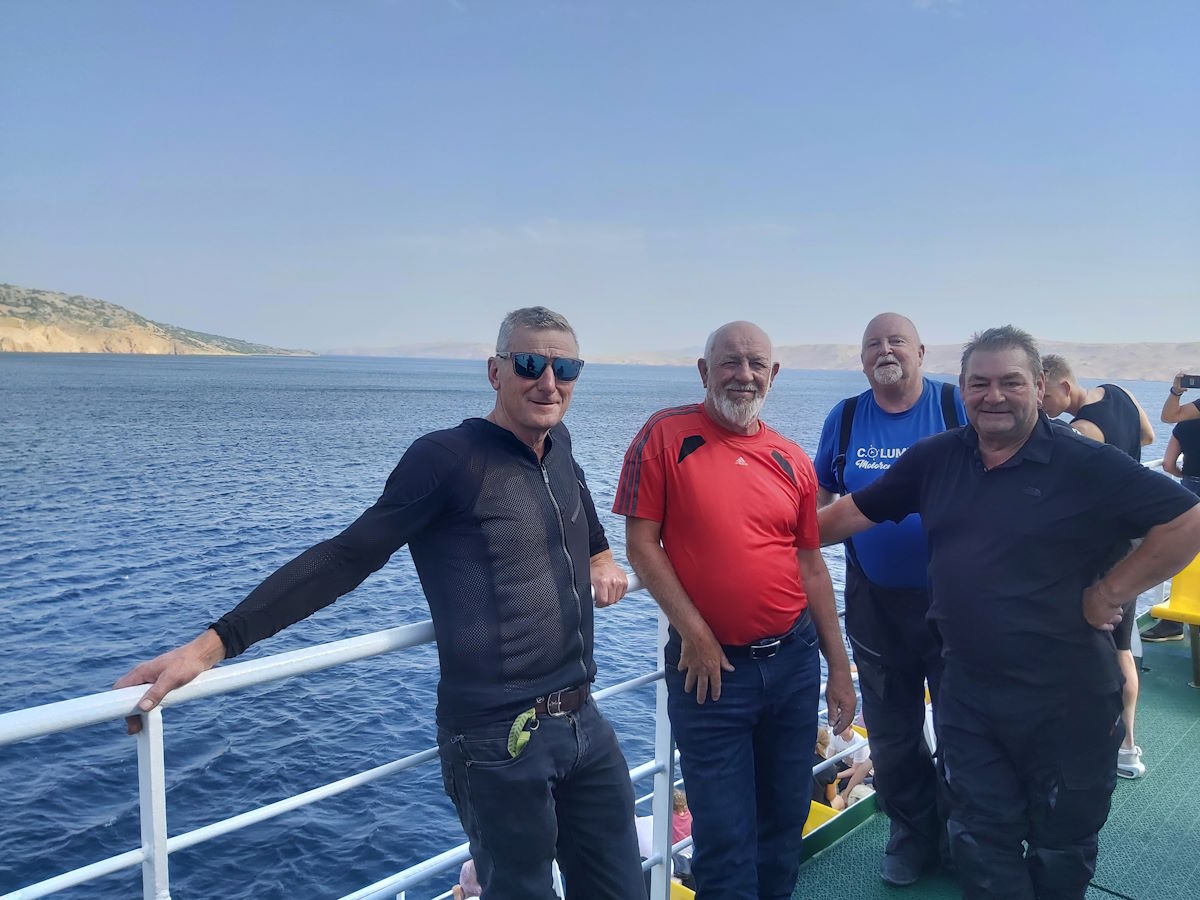 First Adriatic Sea views Pag Island Ferry Croatian coastline motorcycle tour descent