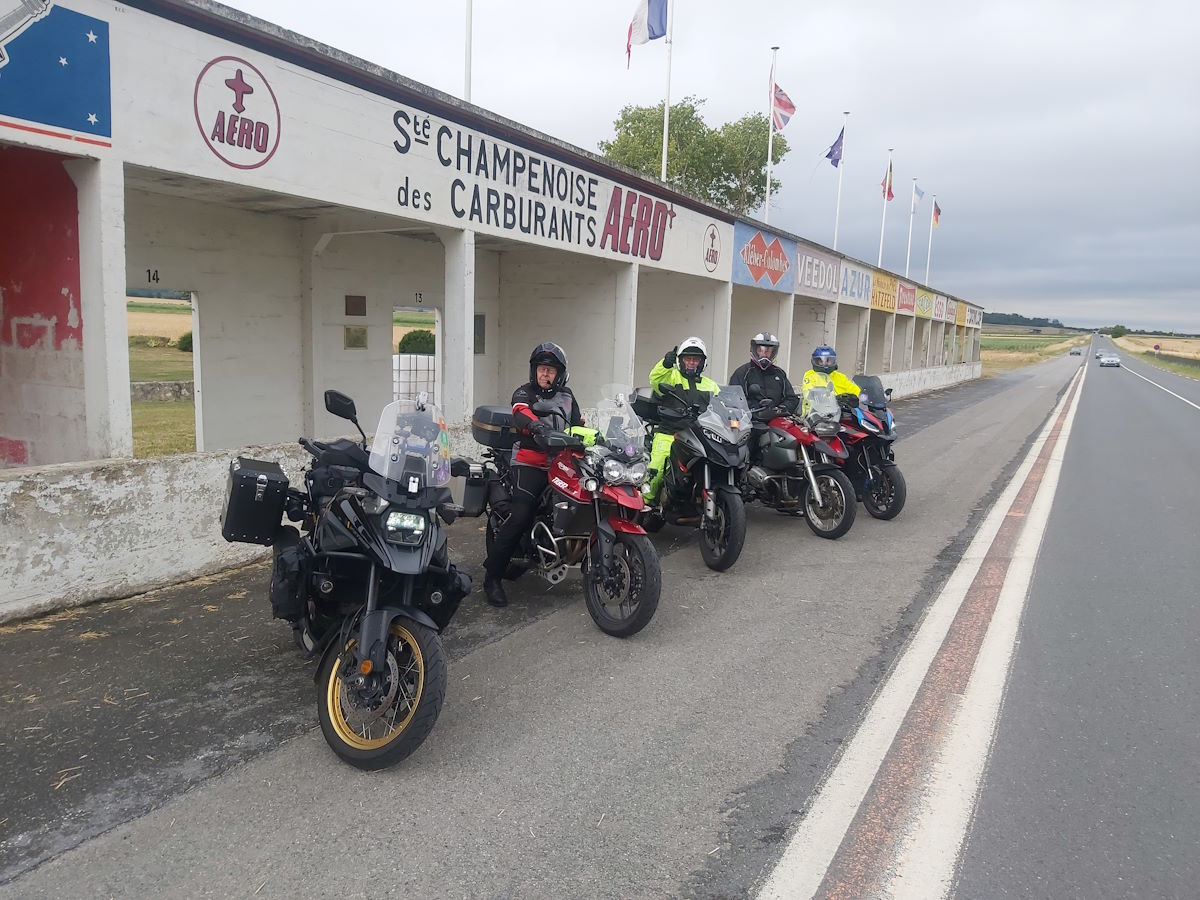 Reims Circuit France motorcycle tour Alps Dolomites rainy day start
