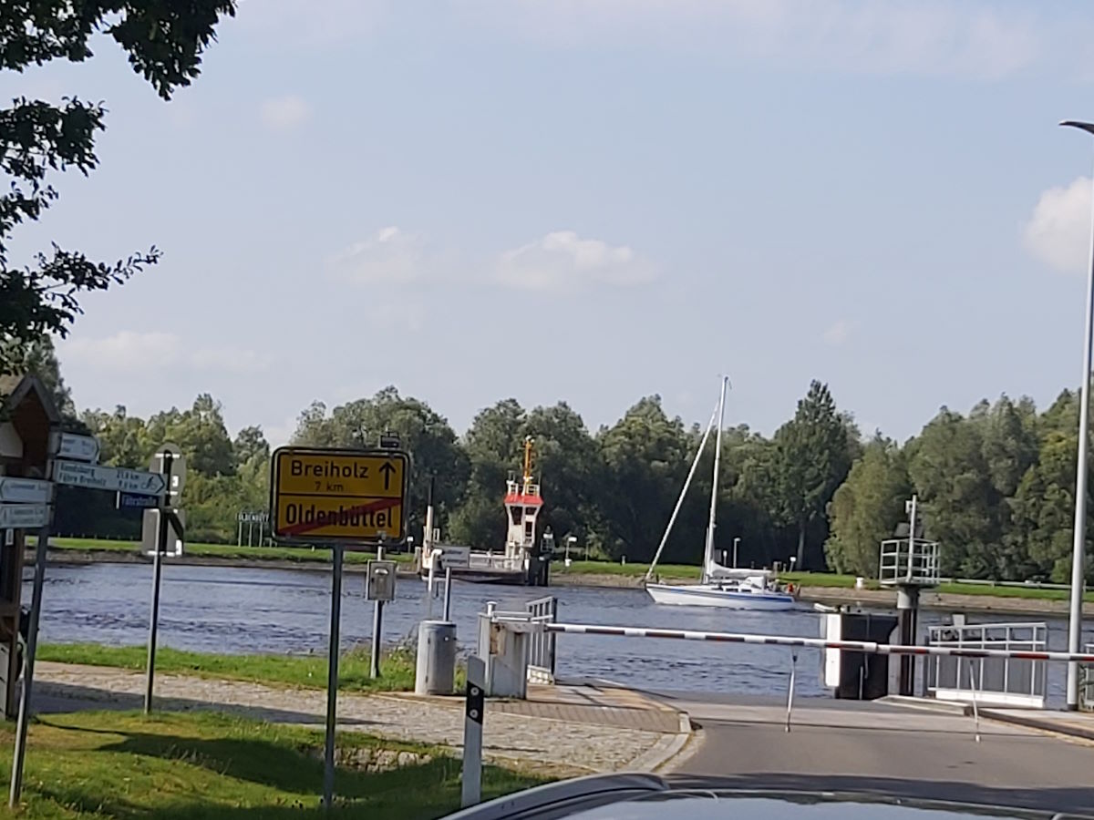 German Kiel Canal ferry crossing countryside open farmland relaxed riding Germany motorcycle tour