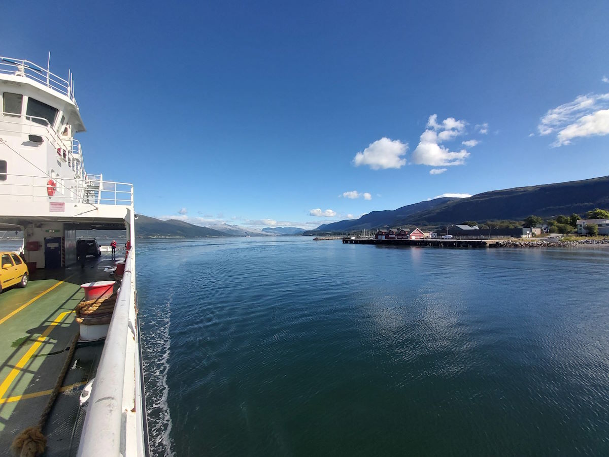 Norwegian coastal highway blue skies ferry crossings Norwegian Sea spectacular views