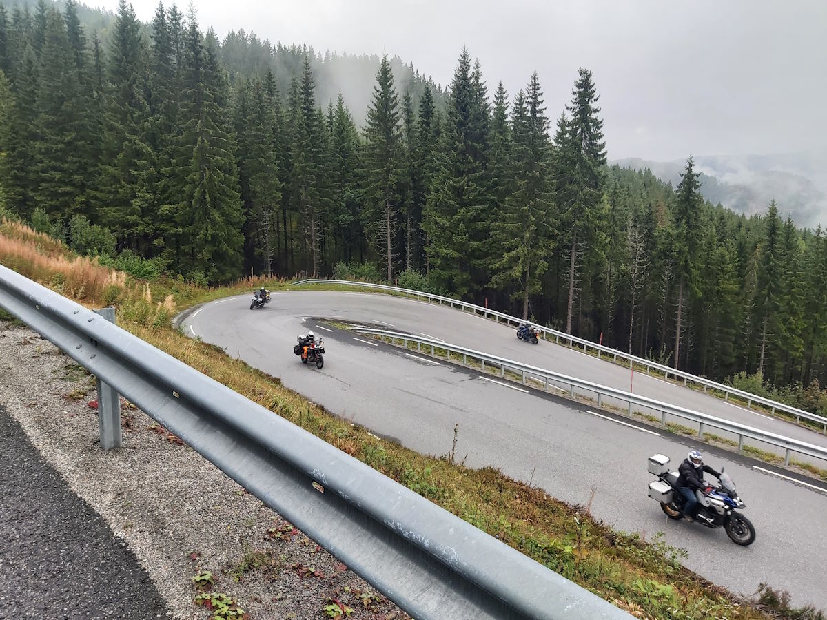 Norwegian back roads pine forests smooth quiet tarmac final day Norway riding