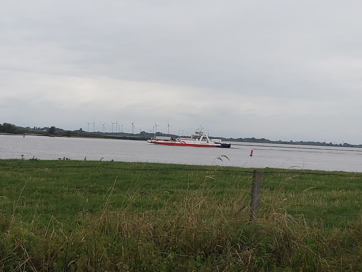 Elbe River ferry crossing Germany final ferries Oldenburg hotel garden sunshine