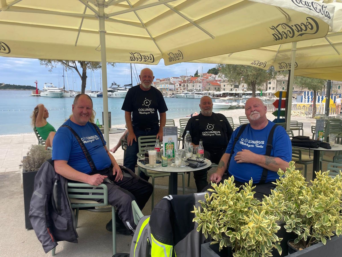Croatian seafront coffee stop luxury yachts Adriatic motorcycle tour