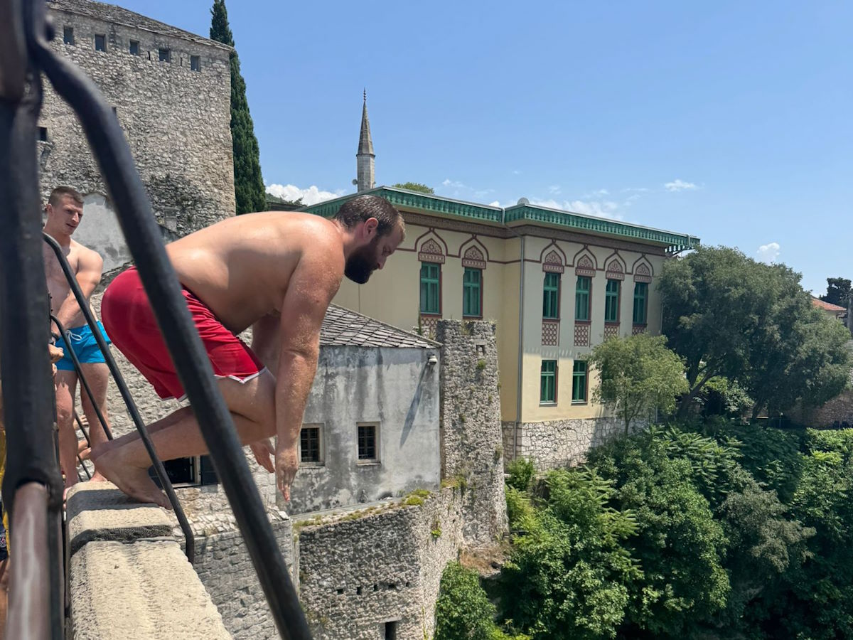 Mostar bridge diver jumping Stari Most Bosnia Herzegovina UNESCO site