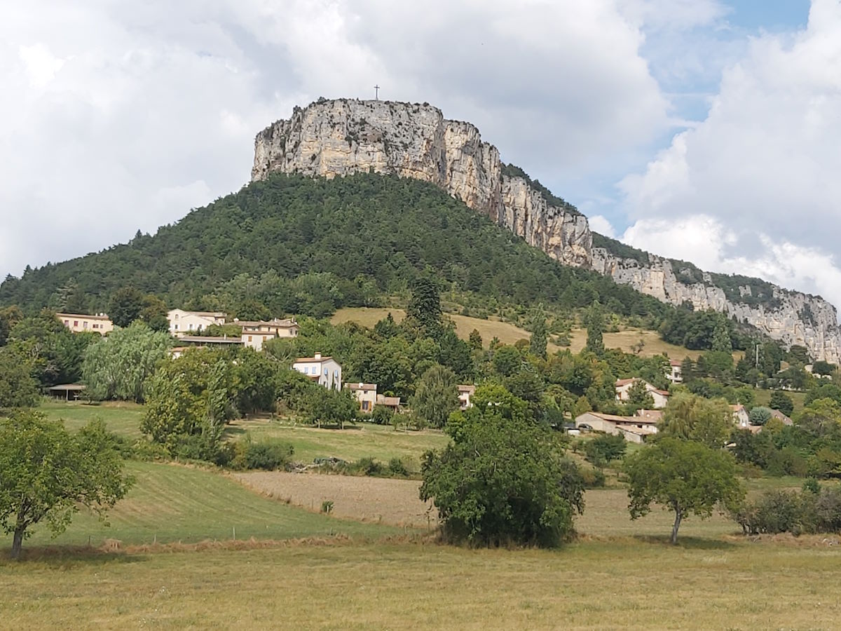 Dramatic limestone cliff rock formation French village Vercors National Park Route Napoleon tour September 2024