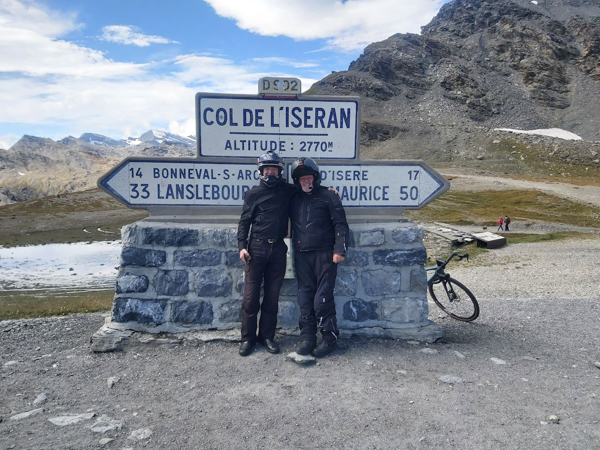 Col de l'Iseran summit sign 2764m highest paved pass Europe motorcycles France Alps 2024