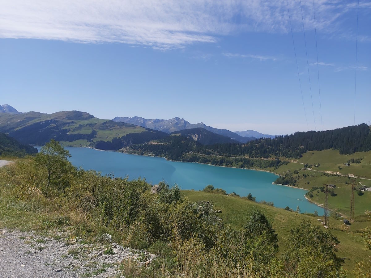 Lac de Roselend Lakeside side stop turquoise water French Alps scenic beauty motorcycle