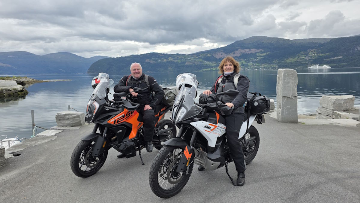 Sue and Richard on their KTMs in Norway with Columbus Motorcycle Tours