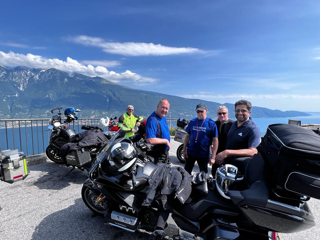 Columbus Motorcycle Tours group at a viewpoint stop above Lake Garda on the Alps & Dolomites tour